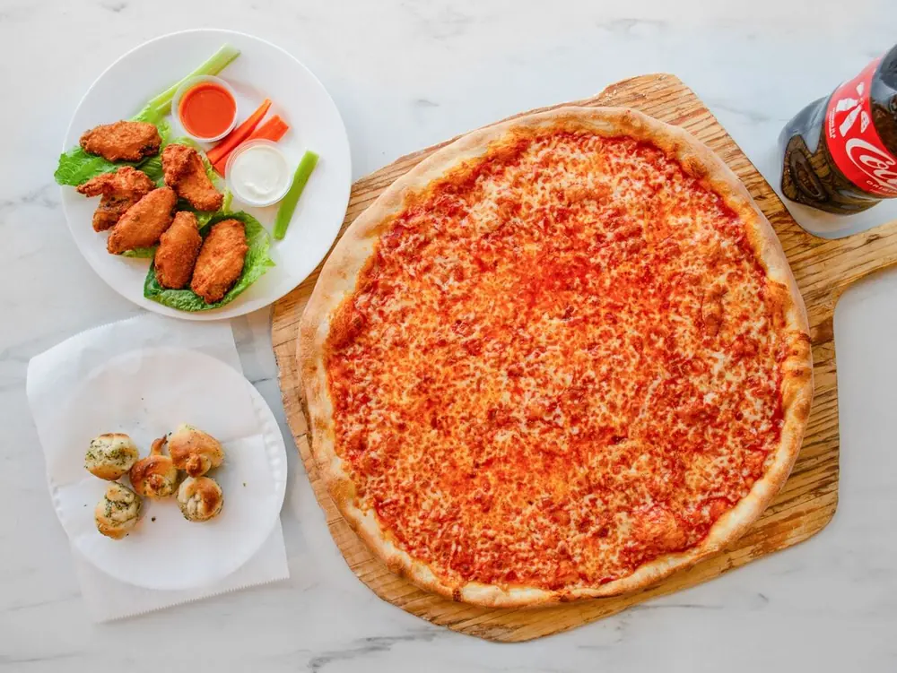 Pizza with wings and garlic knots